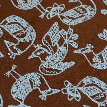 Birds in a lace pattern Brown