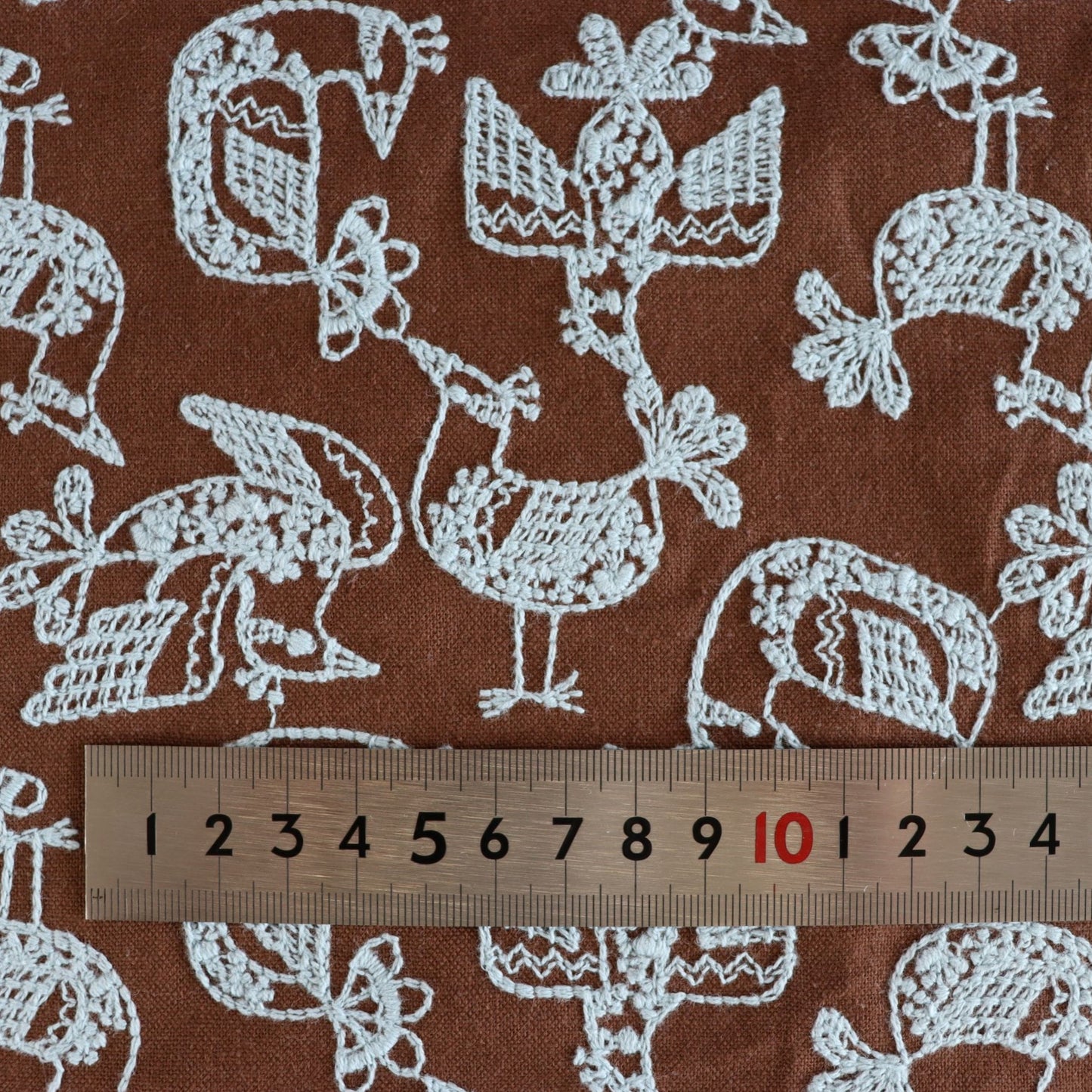 Birds in a lace pattern Brown